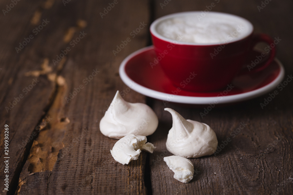 mouth-watering meringue on a wooden background mouth-watering meringue on a wooden background