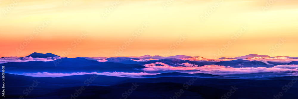 Fototapeta premium Sunset on the West Coast of Scotland from the summit of Ben Horn in Sutherland
