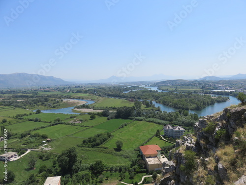 Fertile plains in valley with river  © Mladen