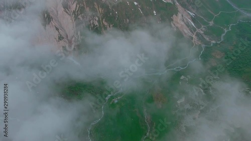 Drone shot above the French Alps in early summer 19