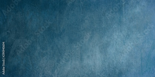 Denim background. Shabby jeans. Craft blue background.