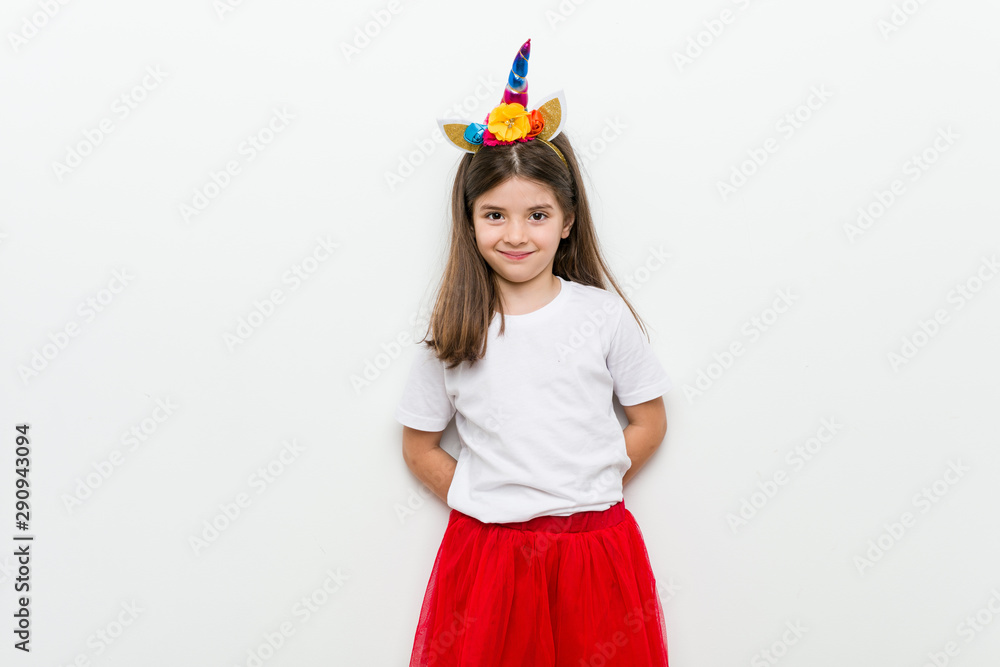 Little caucasian girl with costume and accessories having fun Little caucasian girl with costume and accessories having fun