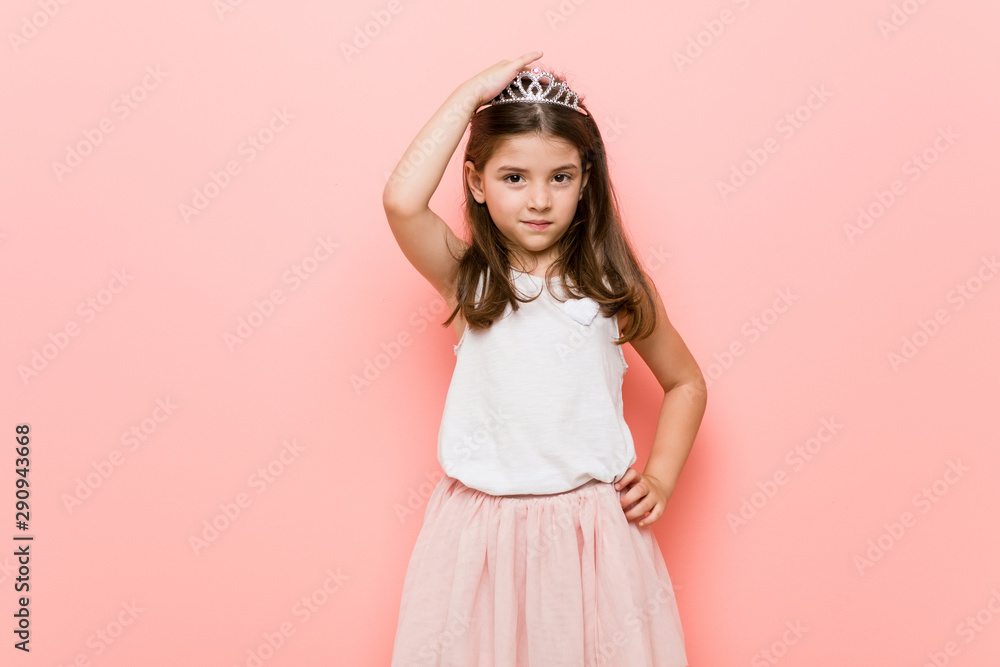 Little girl wearing a princess look being shocked, she has remembered important meeting. Little girl wearing a princess look being shocked, she has remembered important meeting.