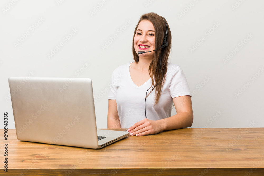 Young telemarketer woman happy, smiling and cheerful. Young telemarketer woman happy, smiling and cheerful.