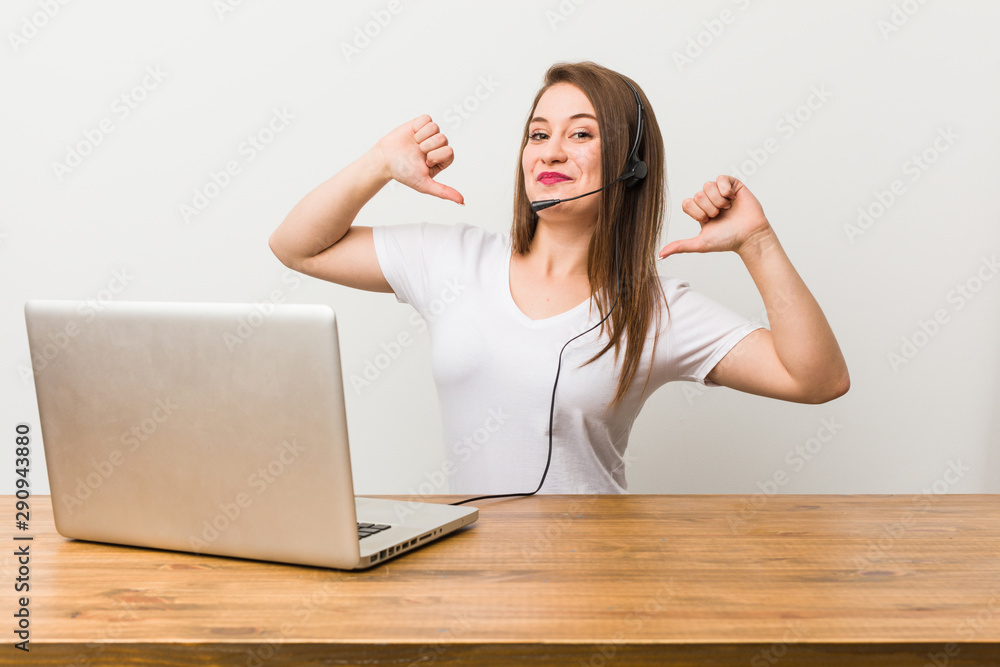 Young telemarketer woman feels proud and self confident, example to follow. Young telemarketer woman feels proud and self confident, example to follow.