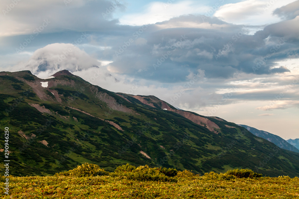 View of the volcano Vilyuchinsky in overcast weather, Kamchatka Peninsula, Russia