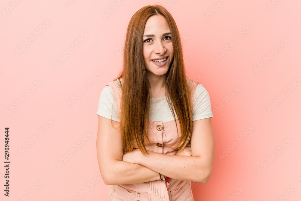 Young ginger woman with freckles laughing and having fun. Young ginger woman with freckles laughing and having fun.