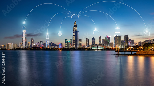 shenzhen city skyline and Mobile Communication Concept © JINGYUAN