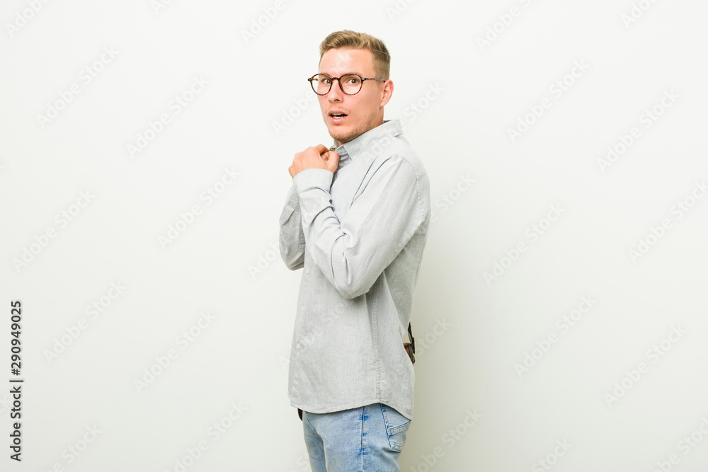 Young caucasian business man scared and afraid. Young caucasian business man scared and afraid.