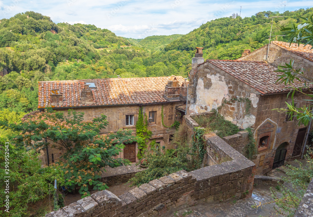 Sorano (Italy) - An ancient medieval hill town hanging from a tuff stone in province of Grosseto, Tuscany region, know as the Little Matera.