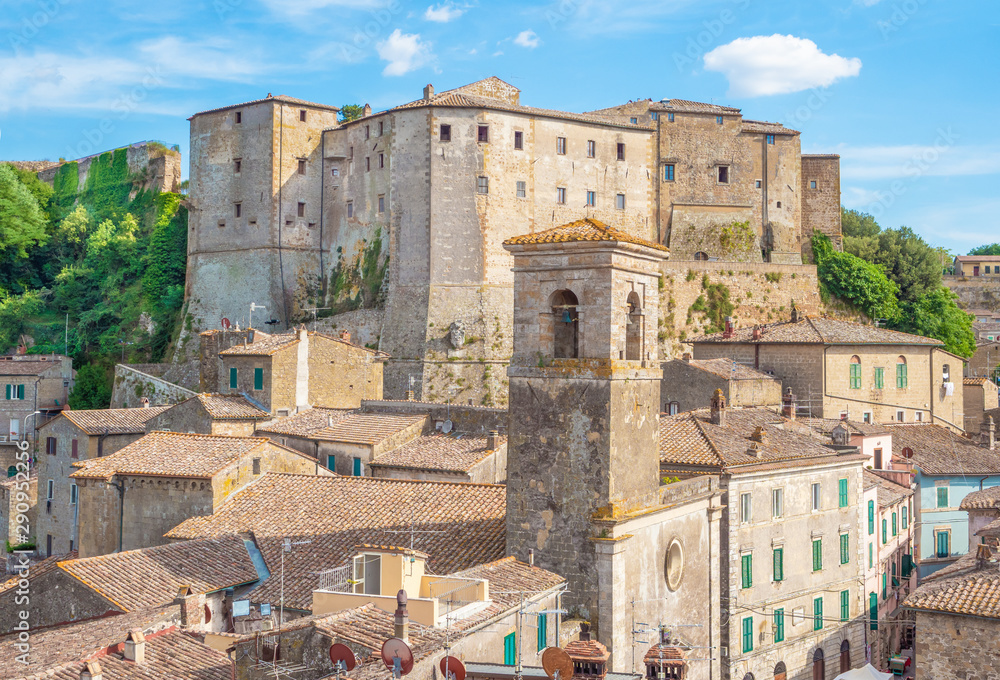 Sorano (Italy) - An ancient medieval hill town hanging from a tuff stone in province of Grosseto, Tuscany region, know as the Little Matera.