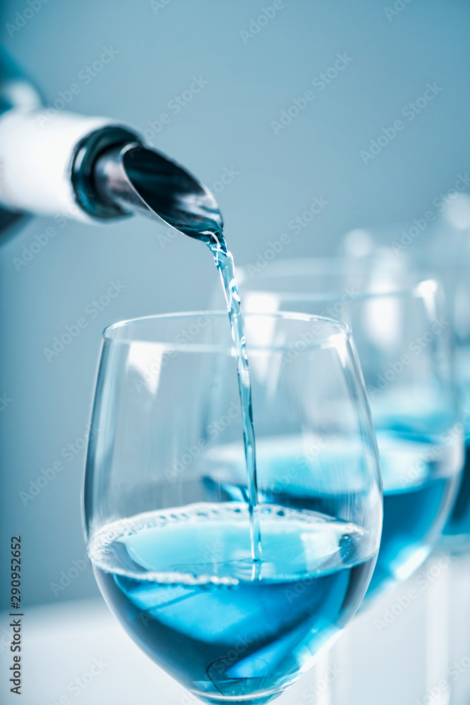 Blue Wine Pouring