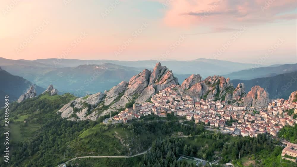 Aerial shot of small cozy mountain town Pietrapertosa located in Dolomiti lucane mountains in Basilicata region in the southern Italy Aerial shot of small cozy mountain town Pietrapertosa located in Dolomiti lucane mountains in Basilicata region in the southern Italy