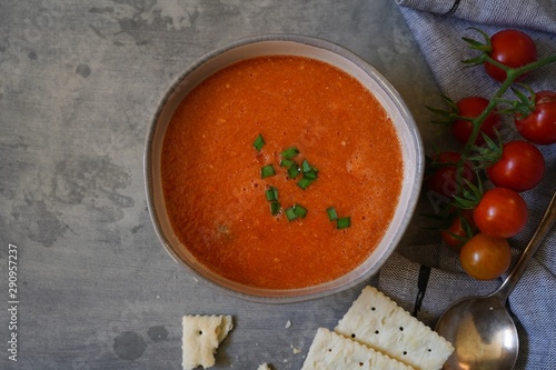 Homemade tomato Gazpacho served in a bowl, selective focus photo