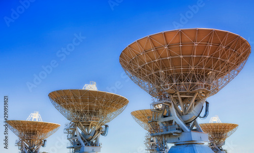 Antennae 5 dish tops sky photo