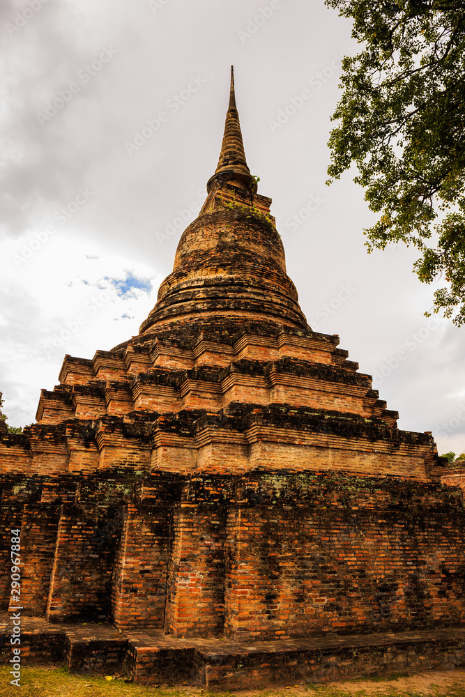 Fototapeta premium Wat Mahathat Temple in the precinct of Sukhothai Historical Park, Wat Mahathat Temple is UNESCO World Heritage Site, Thailand.