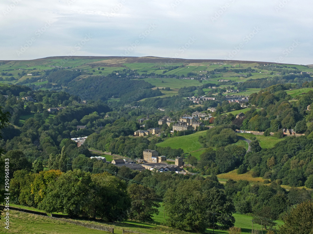 a panoramic view of west yorkshire countryside with trees and fields in the calder valley with the villages of luddenden and luddenden foot alongside the rochdale canal a panoramic view of west yorkshire countryside with trees and fields in the calder valley with the villages of luddenden and luddenden foot alongside the rochdale canal
