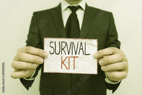 Handwriting text Survival Kit. Conceptual photo Emergency Equipment Collection of items to help someone