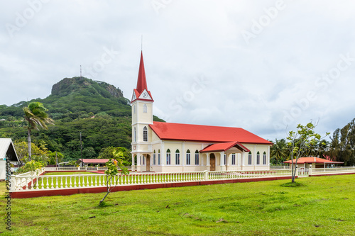 The building on the background of a mountain landscape  Raiatea island  French Polynesia. Copy space for text.