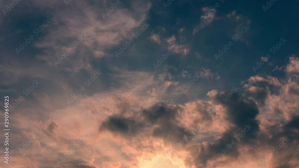 4K timelapse clouds at sunset. Epic cloudscape shot in fast moving in evening hours. Beautiful sky background. 4K timelapse clouds at sunset. Epic cloudscape shot in fast moving in evening hours. Beautiful sky background.