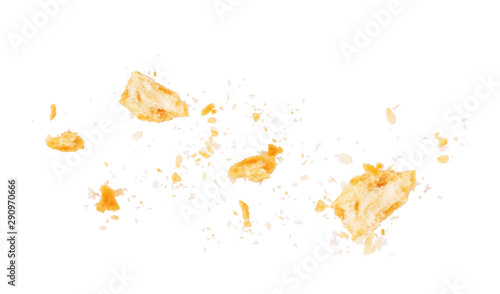 Scattered crumbs isolated on white background photo