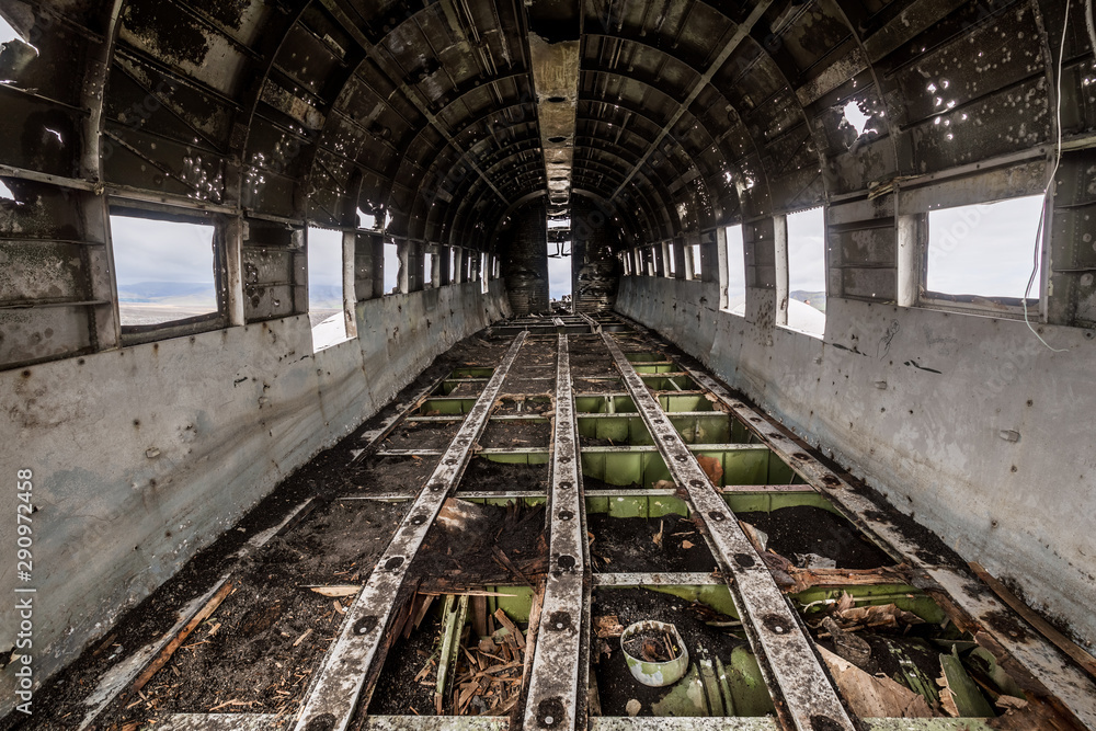 Interior of the fuselage of the wreck of an old, abandoned plane