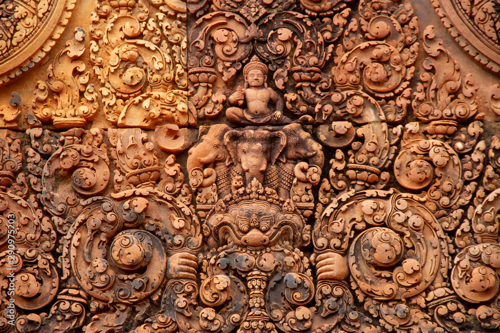 Carved details from Angkor Wat, snakes, dragons, closeup