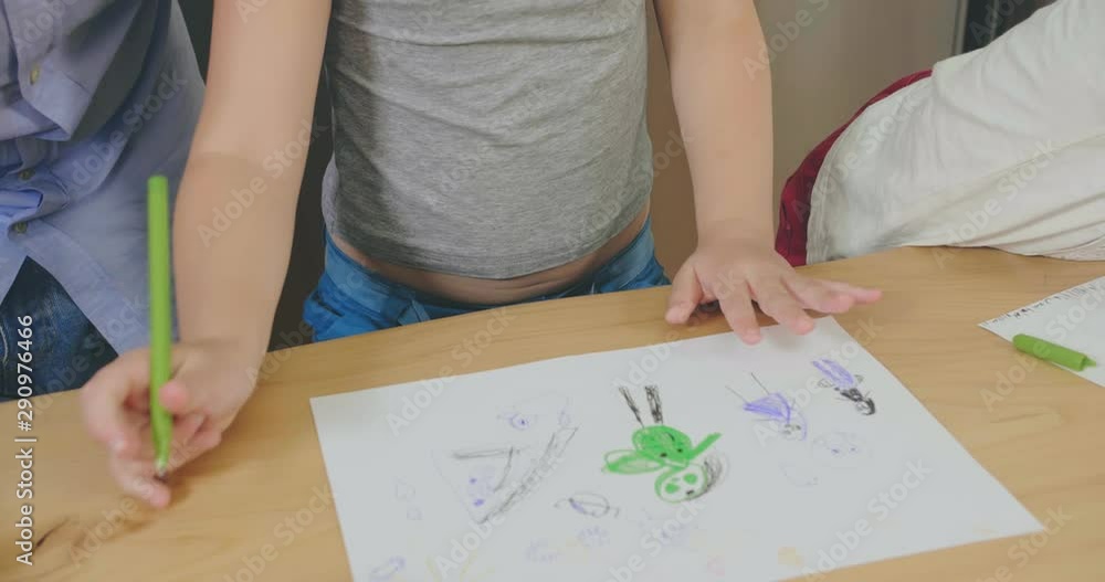 Little girls drawing with pencils Little girls drawing with pencils