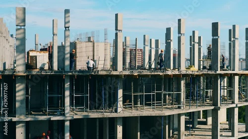 Wallpaper Mural Many contractors work at a building site. Timelapse. Torontodigital.ca