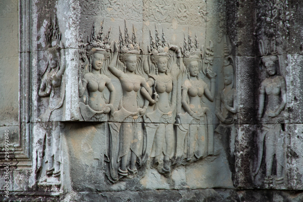 Angkor Wat ladies, relief carving in stone, closeup