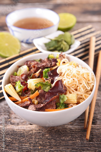 asia soup with noodles, beef and vegetable