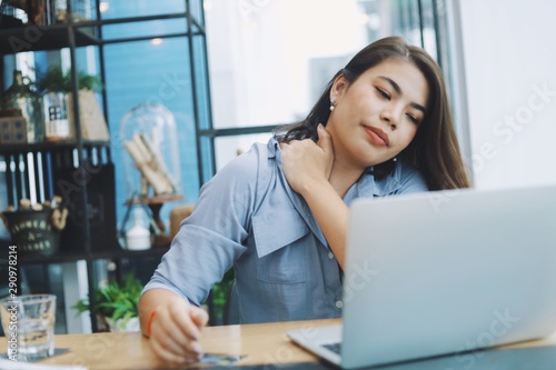 business woman working on laptop in office