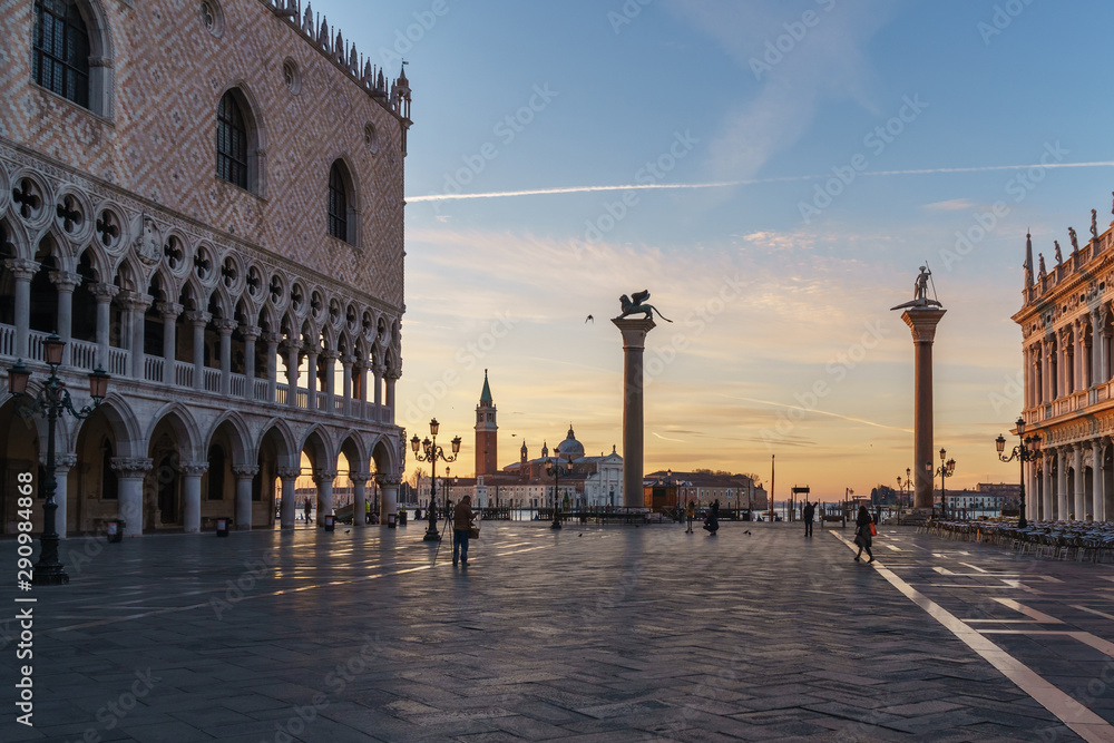 Sunrise view of piazza San Marco, Doge's Palace (Palazzo Ducale) in Venice, Italy. Sunrise cityscape of Venice.