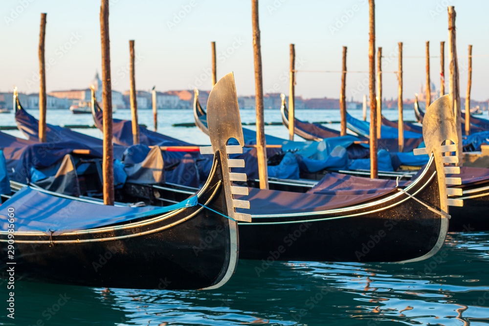 Gondolas by Saint Mark square at sunrise, Venice, Italy Gondolas by Saint Mark square at sunrise, Venice, Italy