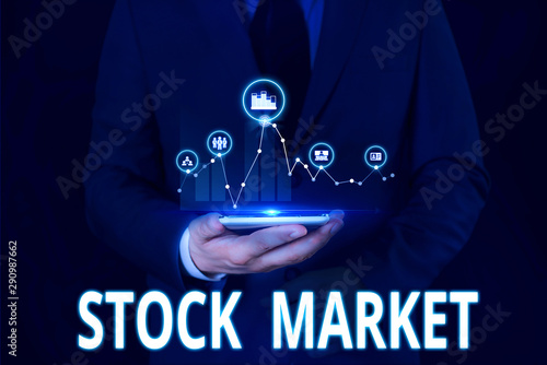 Text sign showing Stock Market. Business photo showcasing Particular market where stocks and bonds are traded or exhange Male human wear formal work suit presenting presentation using smart device photo