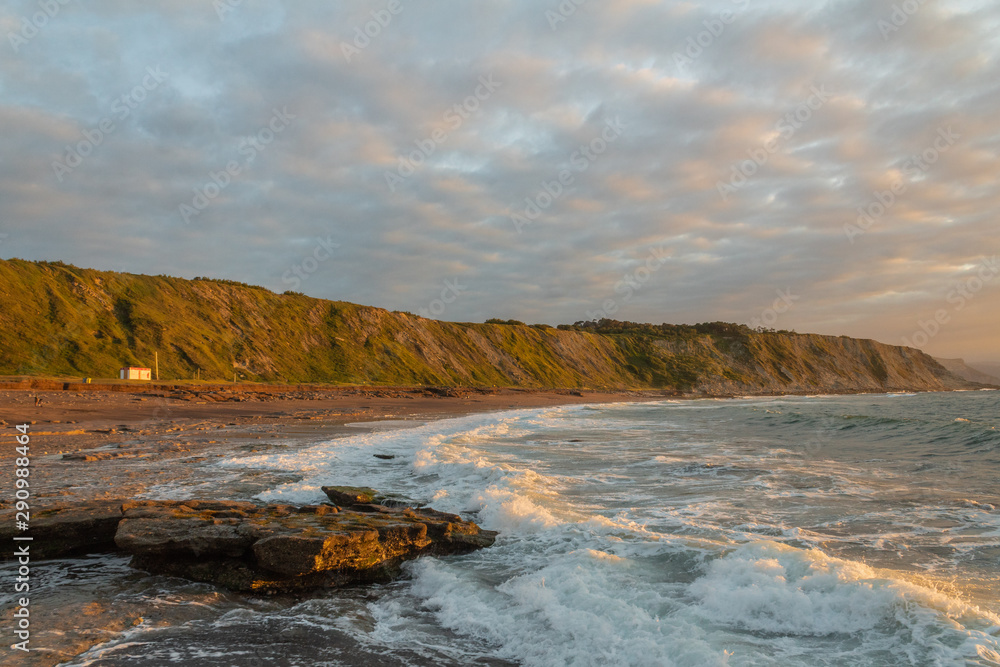 beautiful sunset on the beach of Azkorri, Biscay