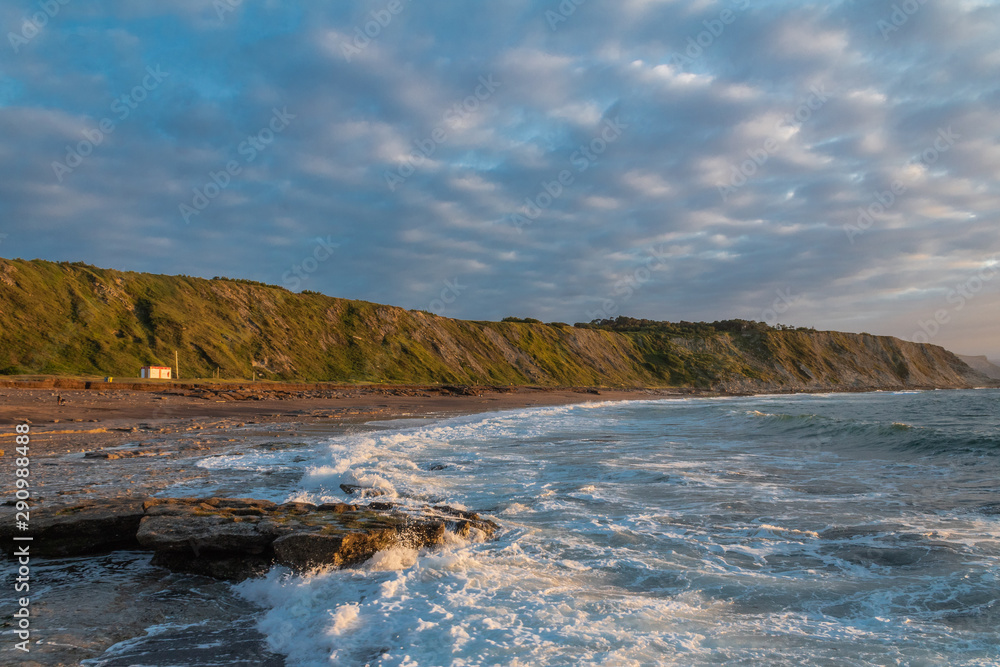 beautiful sunset on the beach of Azkorri, Biscay beautiful sunset on the beach of Azkorri, Biscay