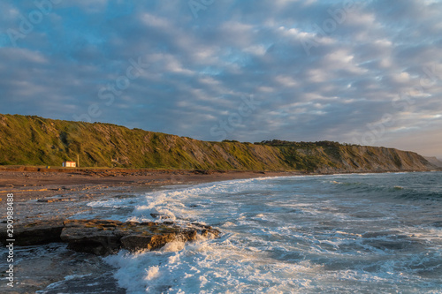 beautiful sunset on the beach of Azkorri, Biscay photo