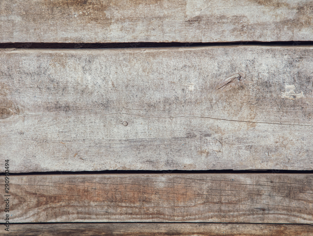 Old wooden boards on the fence as an abstract background Old wooden boards on the fence as an abstract background