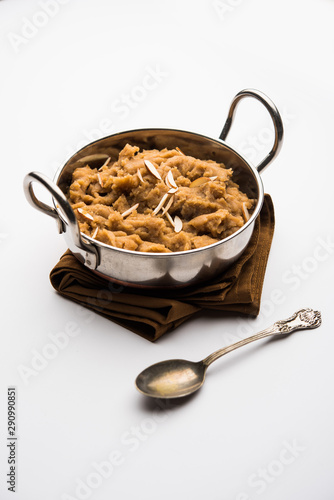 Wheat flour Halwa or Shira or porridge /  Atte ka Halva, Popular healthy dessert or breakfast menu from India. served in a bowl or plate. selective focus photo