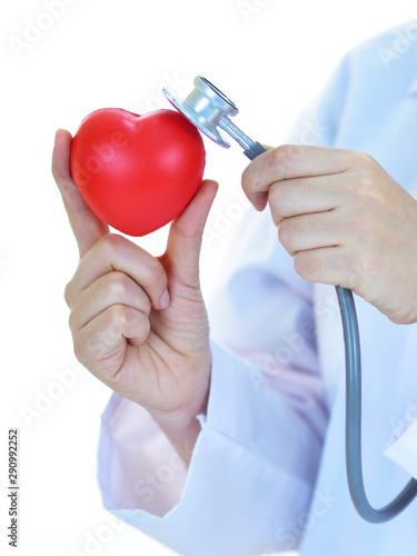 Cardiologist holding heart in hand, heart care concept