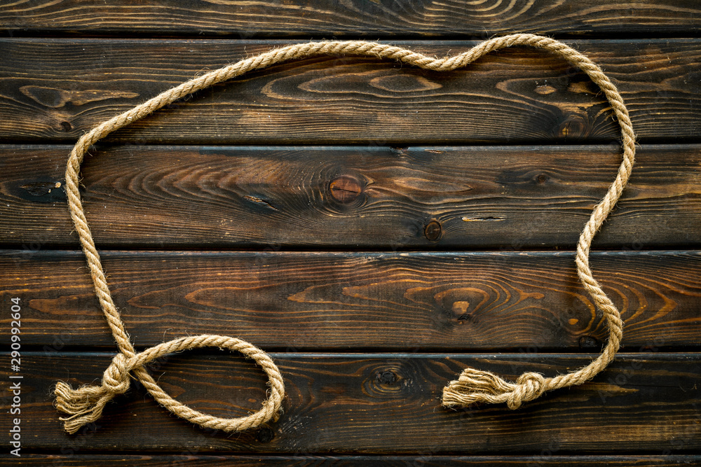 Obraz premium isolated rope mockup on wooden background top view