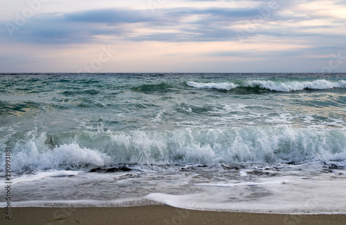 Sunset, cloudy sky and sea