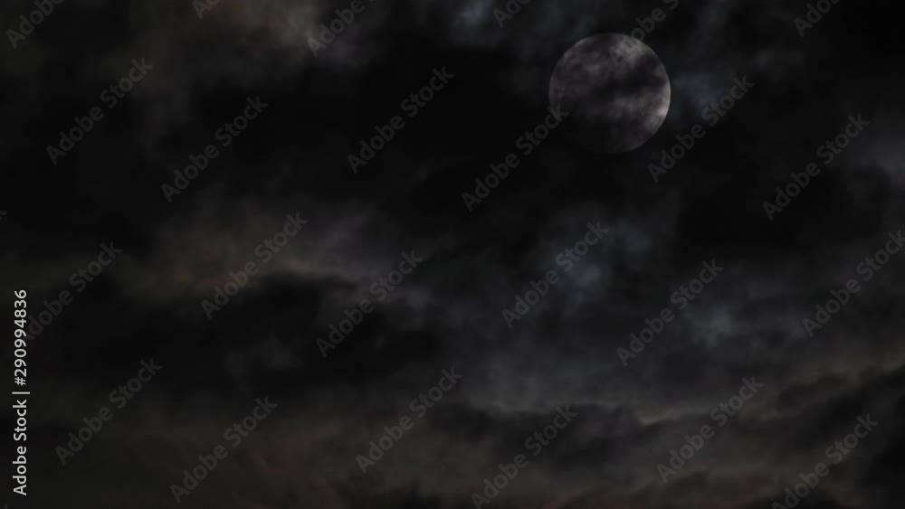 Mysterious night sky with full dramatic moon clouds in the moon light moon. Mysterious night sky with full dramatic moon clouds in the moon light moon.
