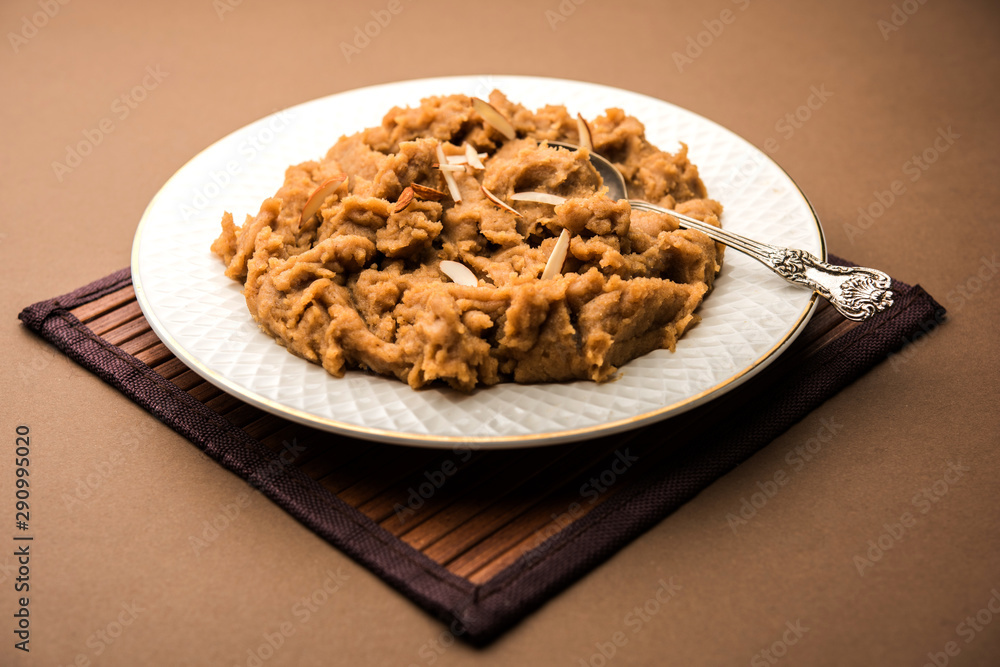 Wheat flour Halwa or Shira or porridge / Atte ka Halva, Popular healthy dessert or breakfast menu from India. served in a bowl or plate. selective focus Wheat flour Halwa or Shira or porridge / Atte ka Halva, Popular healthy dessert or breakfast menu from India. served in a bowl or plate. selective focus