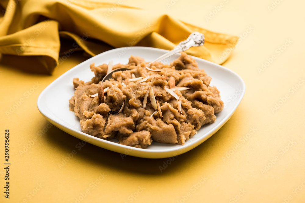 Wheat flour Halwa or Shira or porridge / Atte ka Halva, Popular healthy dessert or breakfast menu from India. served in a bowl or plate. selective focus Wheat flour Halwa or Shira or porridge / Atte ka Halva, Popular healthy dessert or breakfast menu from India. served in a bowl or plate. selective focus