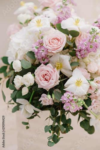 Beautiful fresh flowers to decorate the wedding table and banquet hall in the restaurant. Range of wedding flowers © Olga
