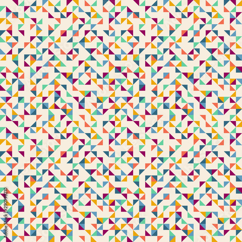 Seamless geometric simple pattern of colored triangles, mosaic. Beige background. Wrapping paper.
