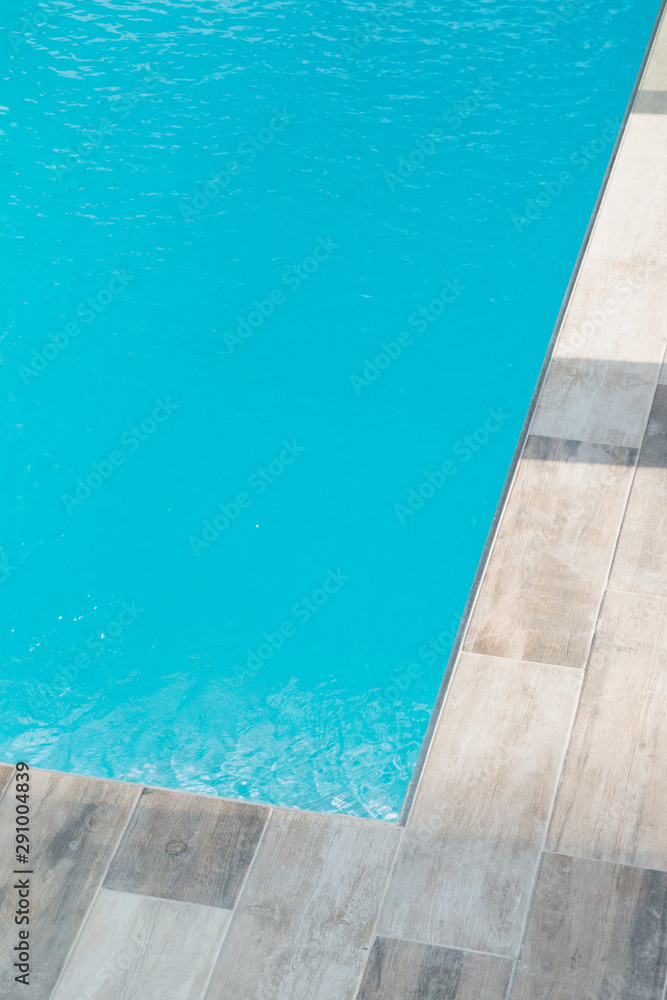 Detail swimming pool with clean blue water
