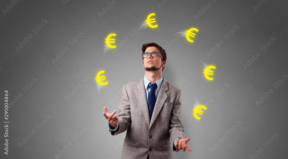 Young happy person juggle with euro symbol Young happy person juggle with euro symbol
